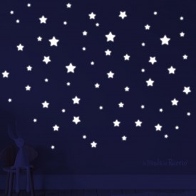 Fluo wall stickers, fluo withe stars softly glowing in the dark.   Photo in the dark