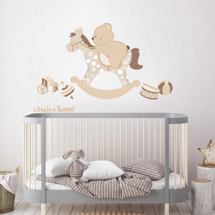 Nursery wall decal "Rocking Horse" with little toys. Beige color. Photo Nursery wall decal "Rocking Horse" with little toys. Beige color. Photo