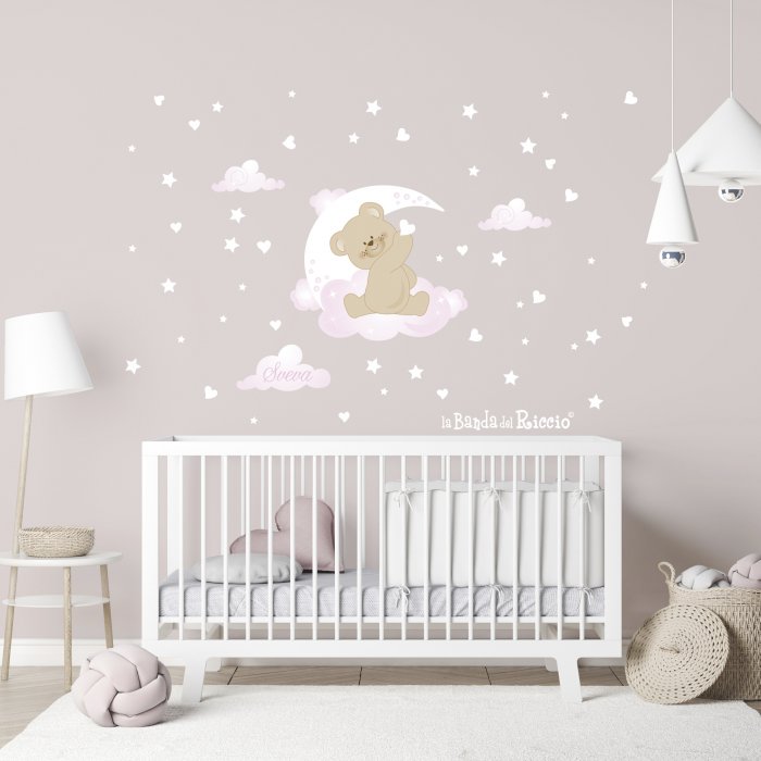 Teddy bear on the cloud with moon, stars and clouds. Photo color withe and pink